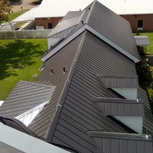 A house with dark brown roof