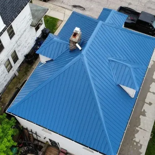 A house with blue color metal roof
