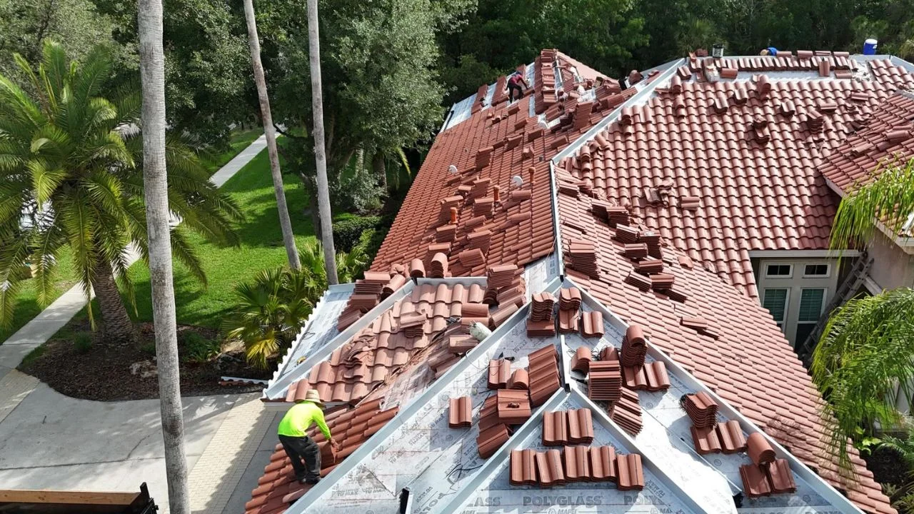 A tiles roof being torn off